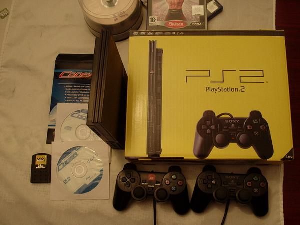 VENDO PS2 SLIM SEMINUEVA