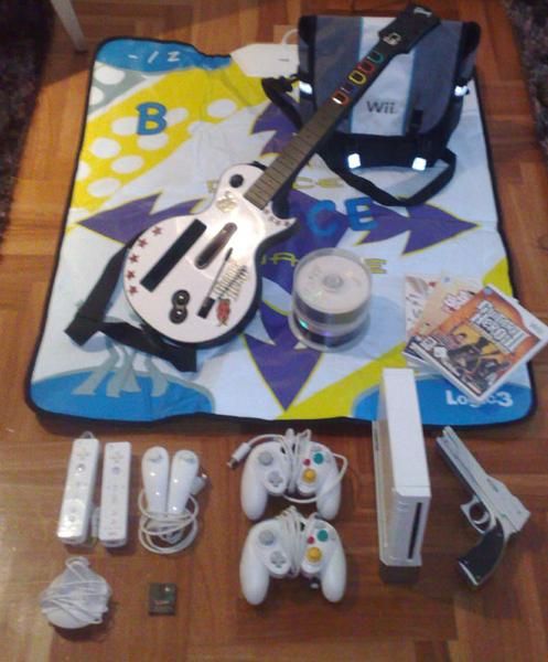 WII con muchos extras en perfecto estado