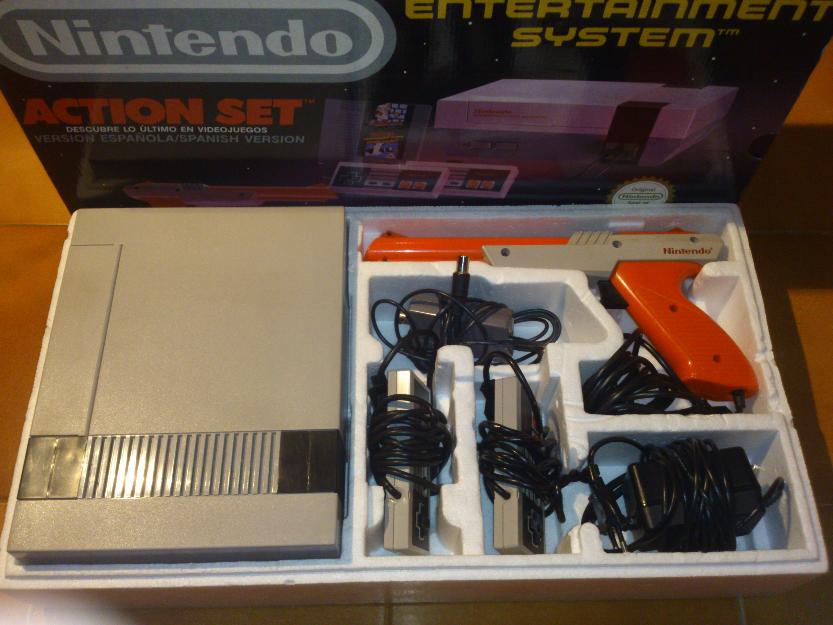 Nintendo NES 8 bytes + pistola zapper + 2 juegos