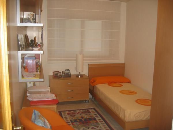 DORMITORIO JUVENIL EN MADERA DE HAYA