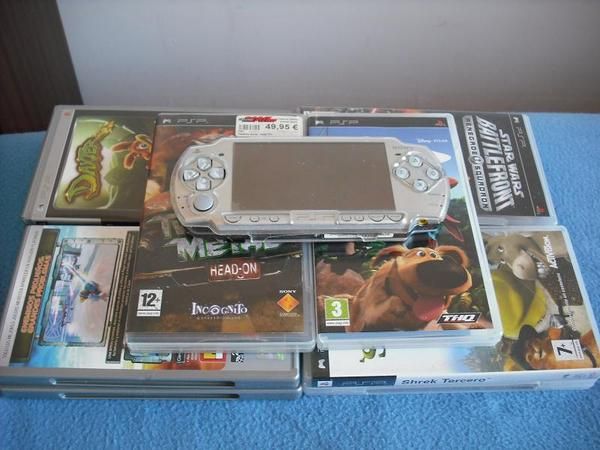 vendo una psp 2 semi nueva con 1 mes de uso 13 juegos nuevos de açao y aventuras y drama super way vivo en girona ciudad