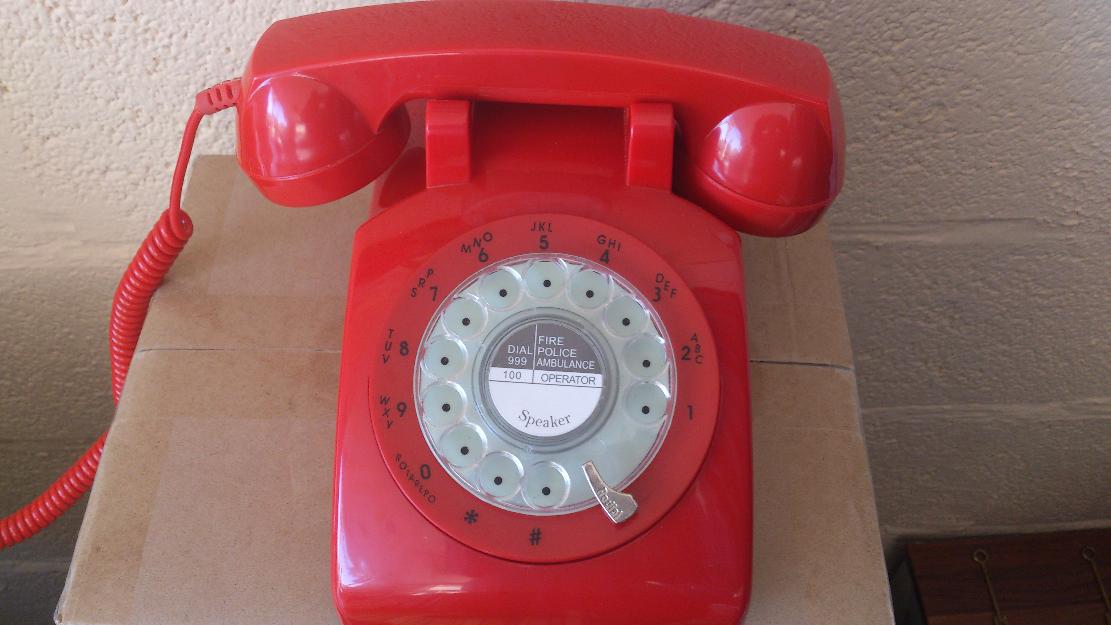 en oferta telefono rojo rueda giratoria